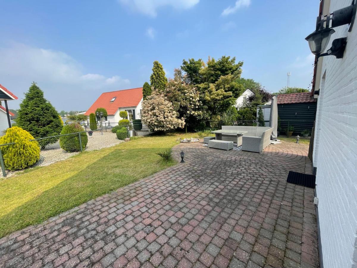 Freistehendes Ferienhaus Am See Naehe Roermond Heel 外观 照片